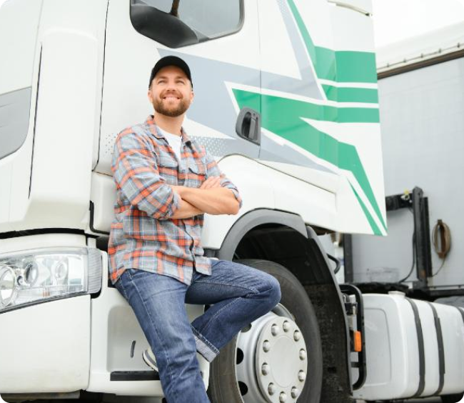 Driver Smiling next to truck