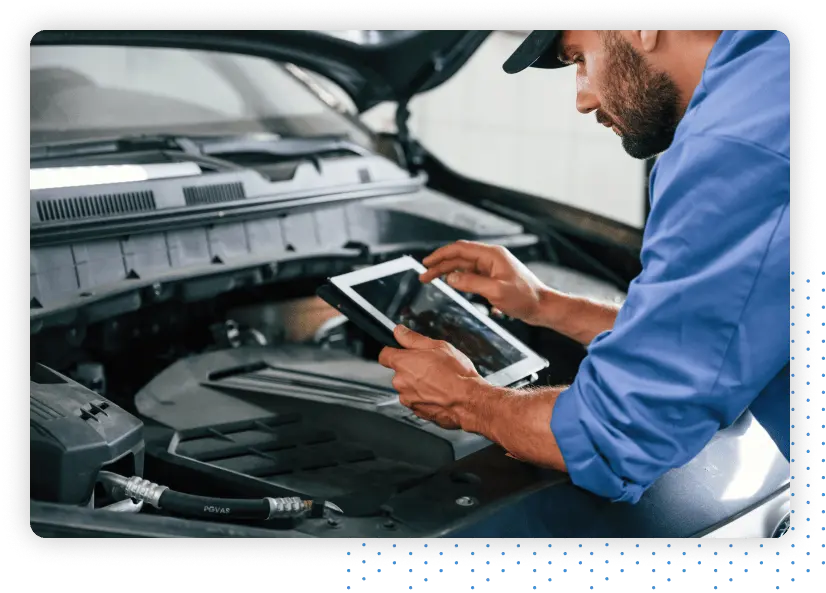 Mechanic working on vehicle